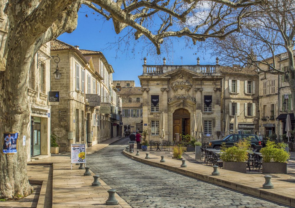 A plane-shaded street in Avignon's old town